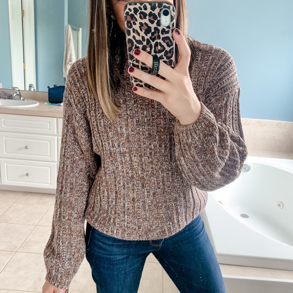 A new day marked sweater
